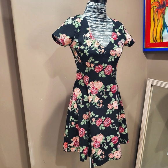 Almost Famous Dresses & Skirts - Floral Fit And Flare Lace Back Black Dress